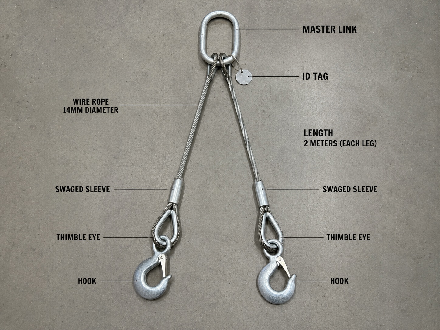2 Leg Wire Rope Sling 14mm x 2m Structure 2 leg wire rope sling 14mm x 2m structure with master link two rope legs hooks thimble eyes and swaged sleeves