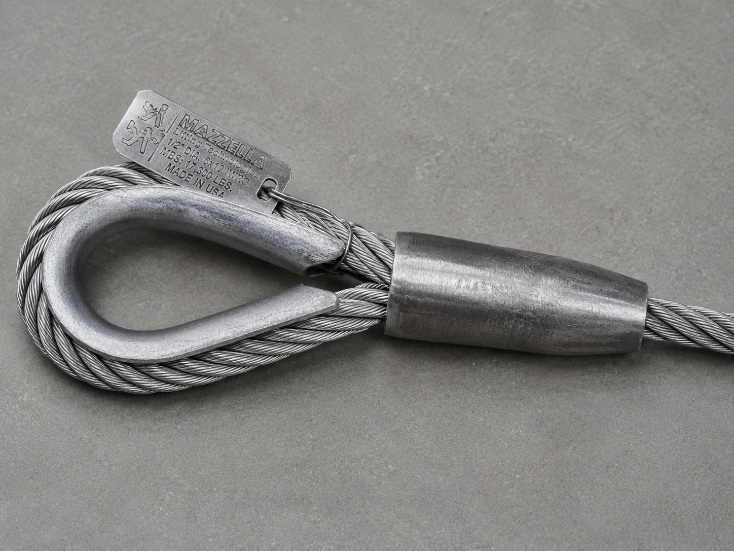 Flemish eye wire rope sling structure with mechanical splice thimble eye swaged steel sleeve and metal tag